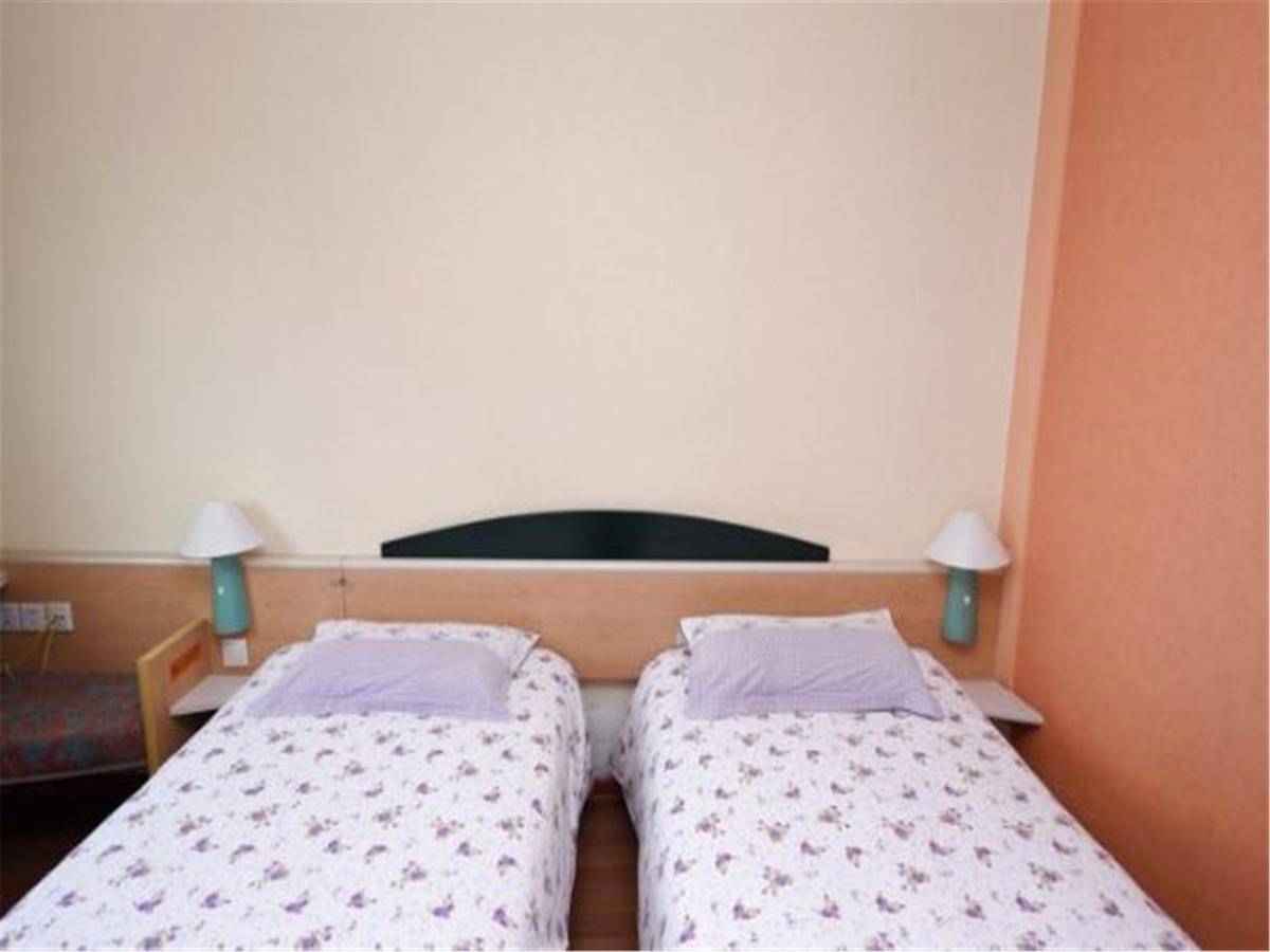 Motel Qingdao Jiaonan Renmin Road Business Street Exterior photo